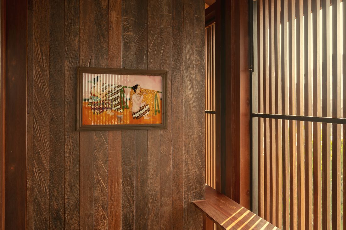 Ironwood wall and timber slats in afternoon light